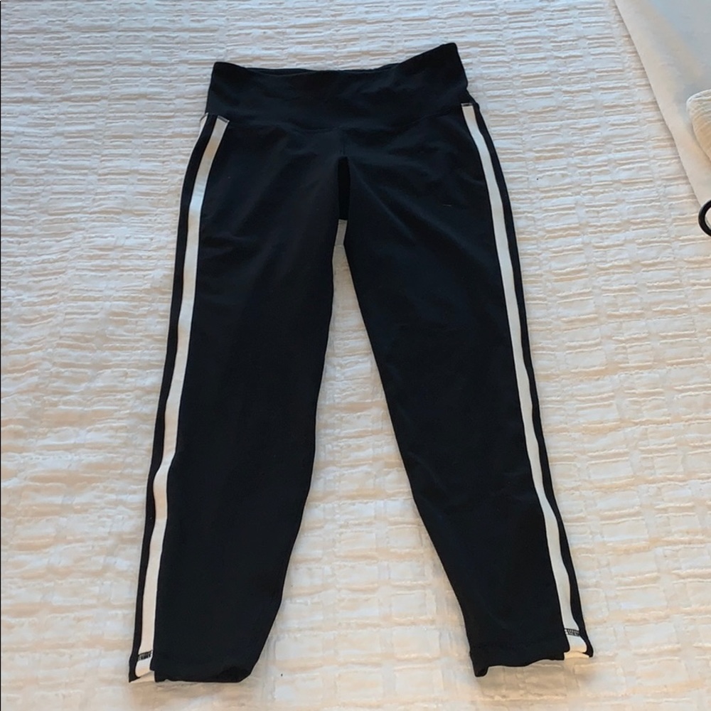 Black leggings with white stripe